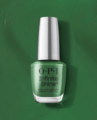OPI Infinite Shine OPI’m a Supermodel bottle standing upright, showcasing vivid green nail polish with a silver cap and gel-like long-wear finish, set on a glossy matching green backdrop—perfect for spring nail colors from OPI.