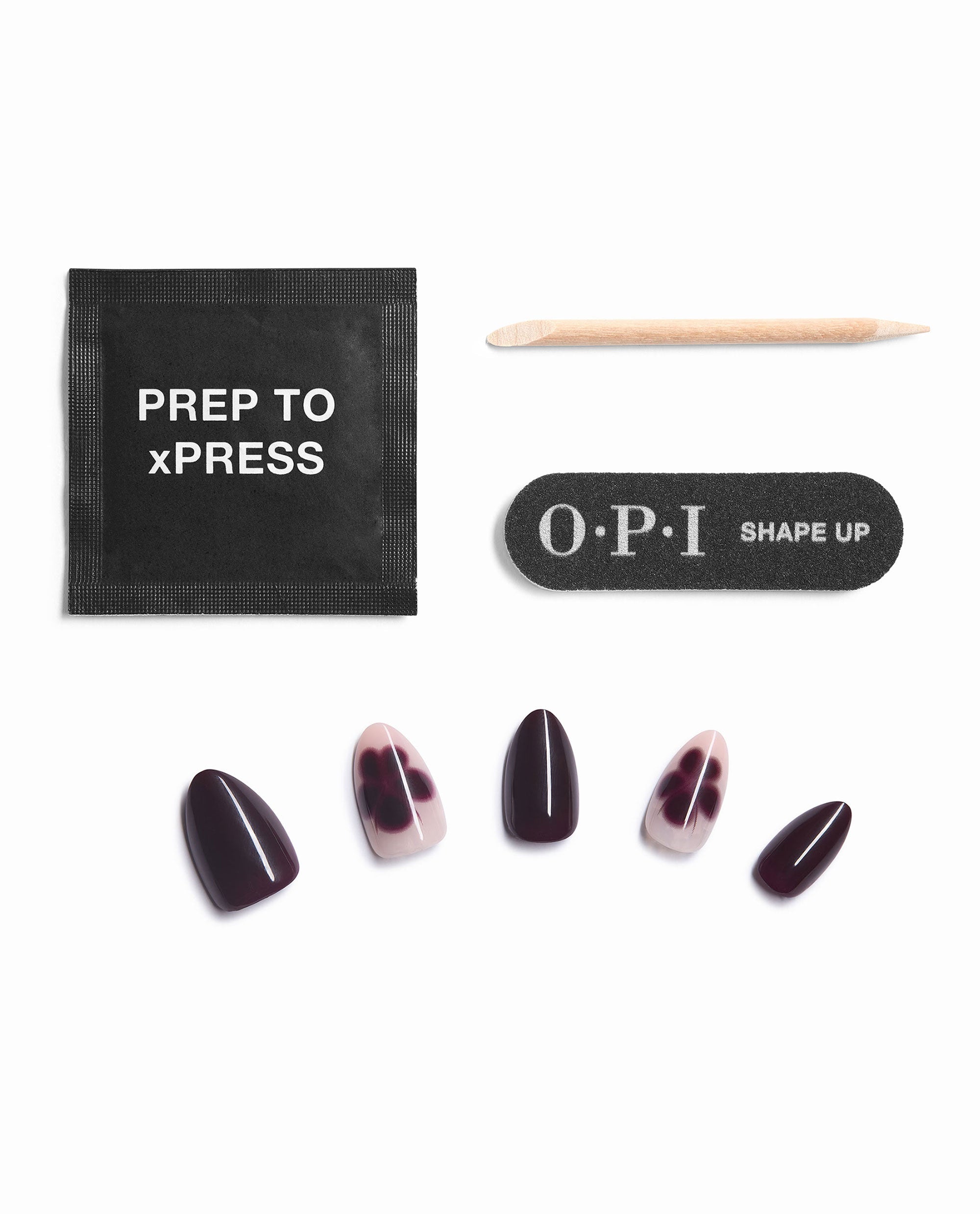 OPI Over the Bloom Sticking Point press-on nail kit arranged on white, featuring deep burgundy and floral blush artificial nails, prep pad, wooden cuticle stick, and nail file for fall nail colors.