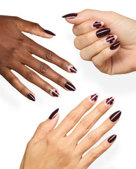 Hands display OPI Over the Bloom Sticking Point manicure with glossy deep burgundy almond nails and pale pink floral accent nails, showcasing fall nail colors on a clean white background.