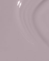 Peace of Mined OPI nail polish brush swatch showing a smooth, glossy coat of muted mauve-lilac nail lacquer with soft light reflections across the even liquid surface, highlighting the creamy, full-coverage finish.