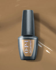 OPI GELelement+ Peanut Butter & Gel-ly at-home gel nail polish bottle rests on glossy peanut-butter brown polish, showcasing a warm neutral shade for fall nail colors.