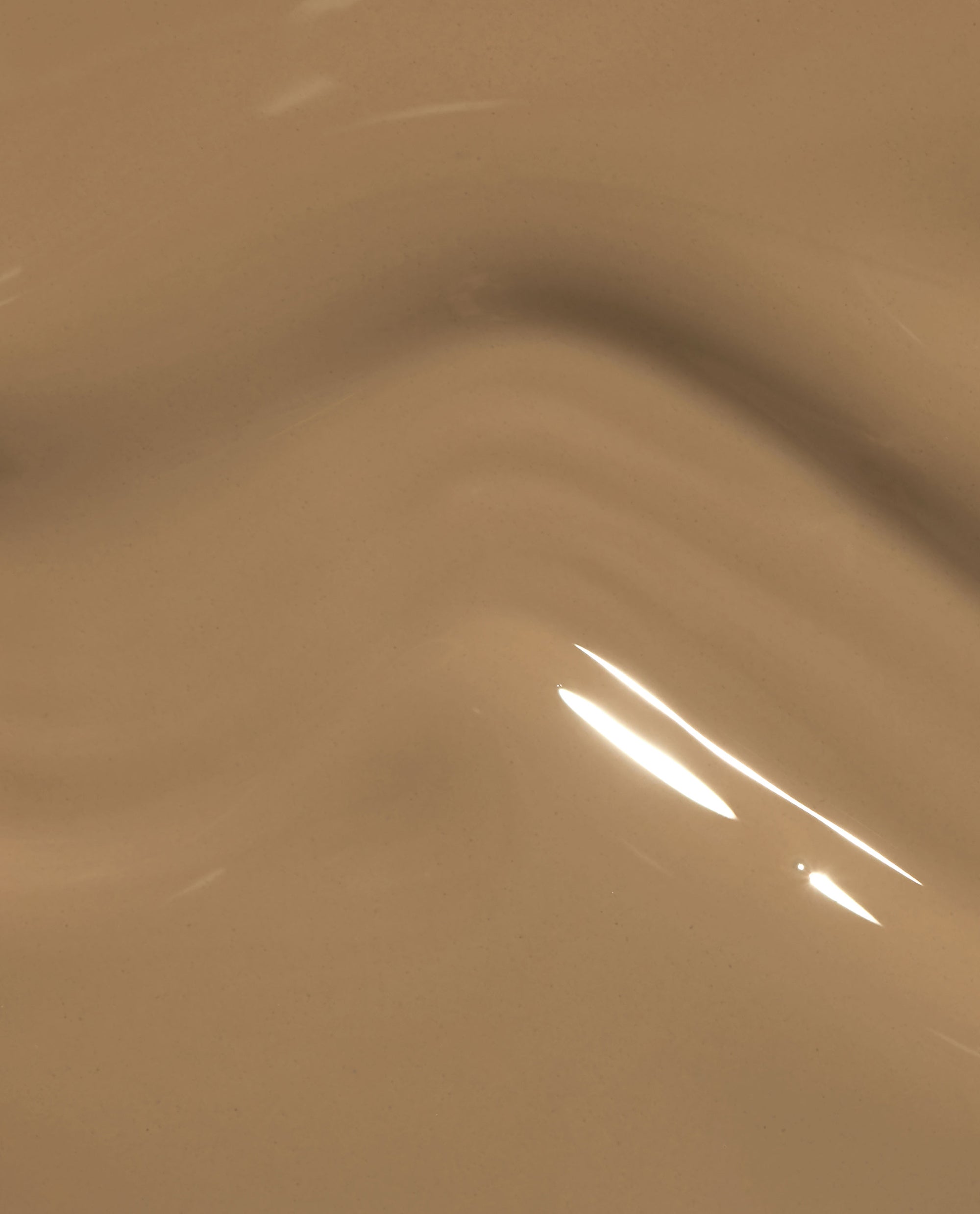Peanut Butter & Gel-ly at-home gel nail polish swatch showing a glossy warm tan-brown OPI shade, ideal for fall nail colors.