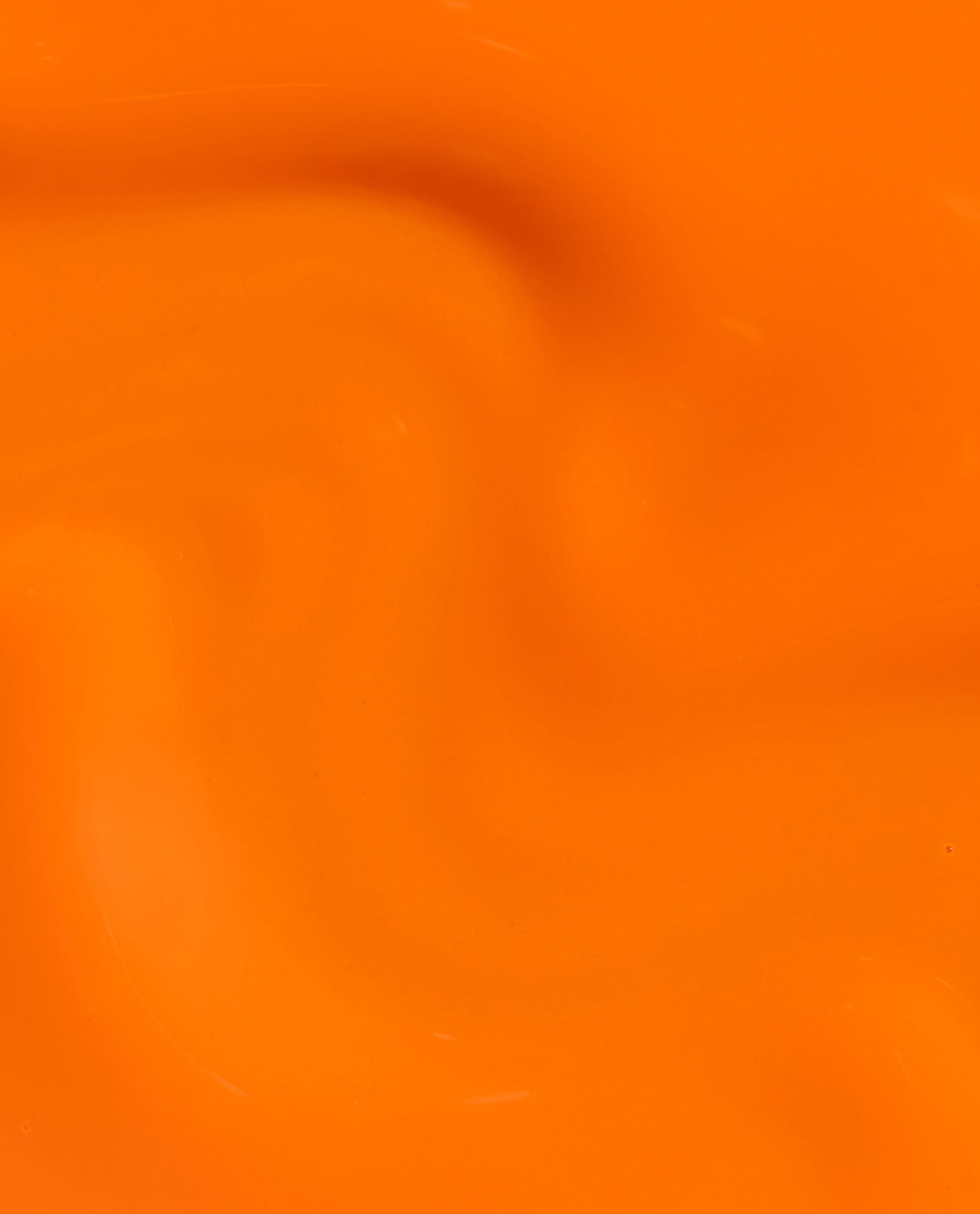 Peel Good Factor at-home gel nail polish swatch shows a glossy vivid orange OPI shade with a smooth, high-shine finish.