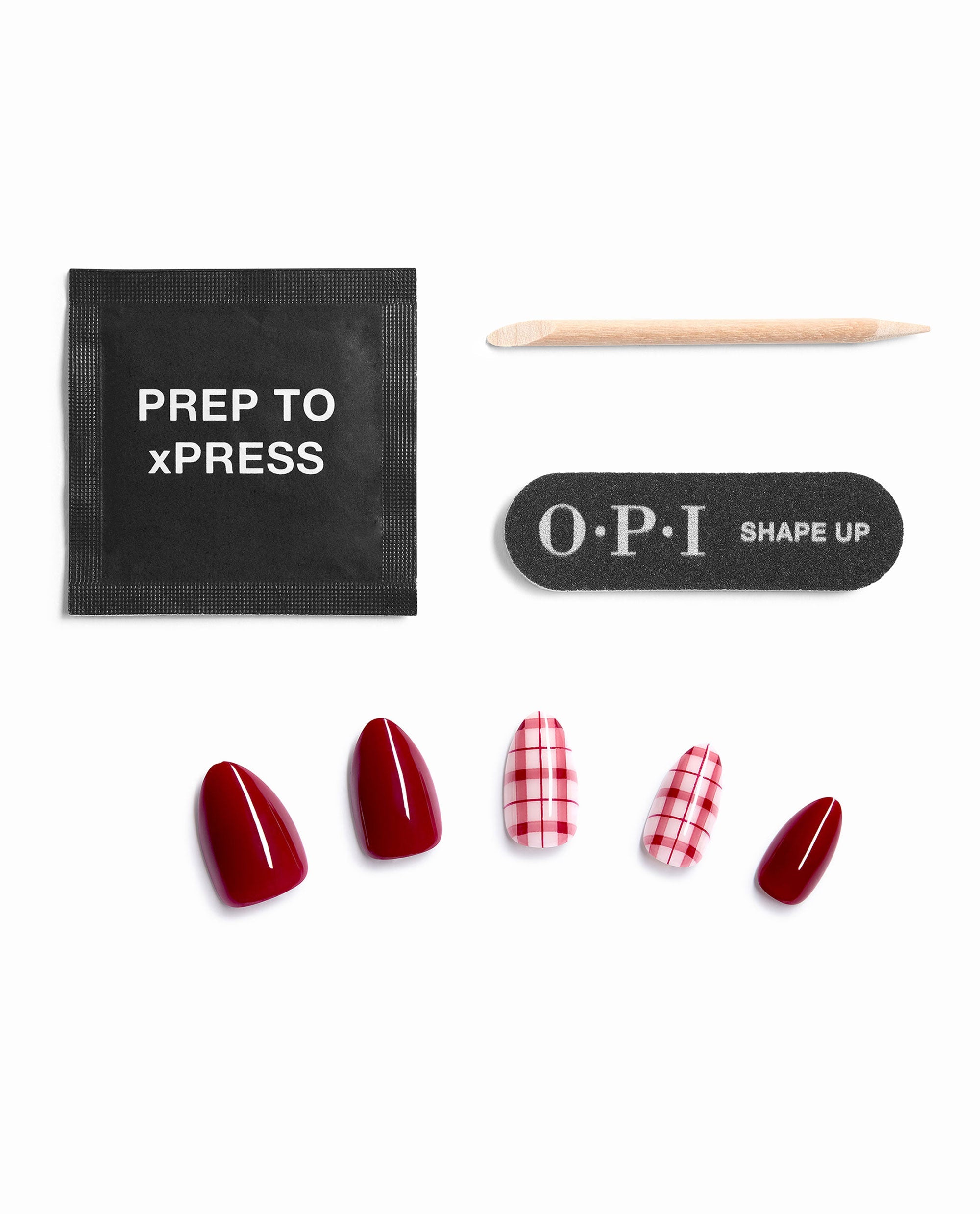 OPI Plaid Behavior Sticking Point press-on nails feature glossy deep red and pink plaid fall nail colors with a prep pad, wooden cuticle stick, and OPI Shape Up nail file on a white background.