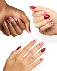 Hands display OPI Plaid Behavior Sticking Point manicure with glossy deep red almond nails and pink plaid accent nail art, showcasing fall nail colors on a clean white background.