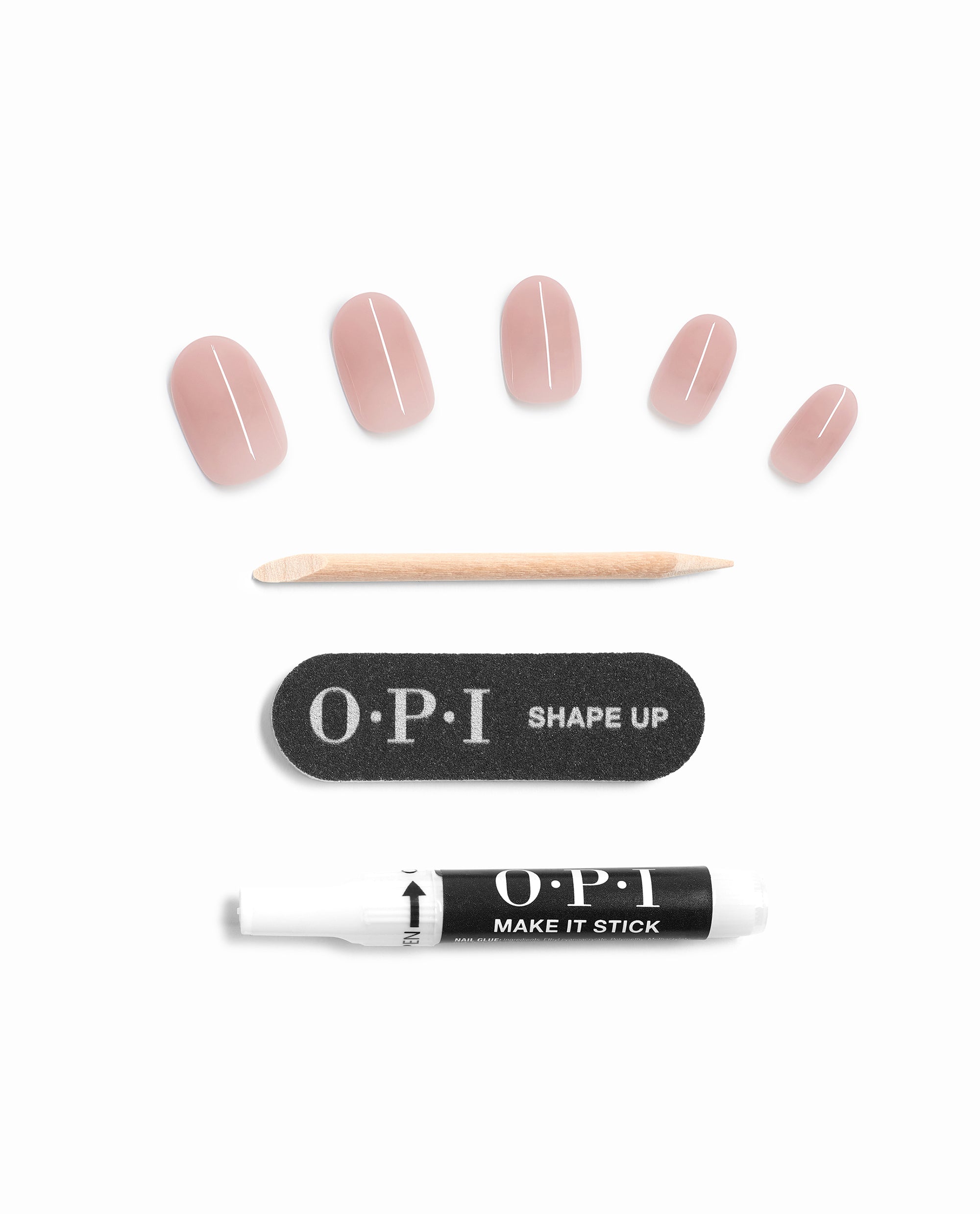 Put it in Neutral On Point set showing soft beige-pink artificial nails, wooden cuticle stick, OPI Shape Up mini nail file, and OPI Make It Stick adhesive pen arranged neatly on a white background, ideal as an OPI nail polish gift set.
