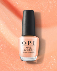 OPI Queens Rule nail lacquer bottle showcasing a trending soft peach shimmer shade with a black cap, centered on a sparkling peach polish-textured background.