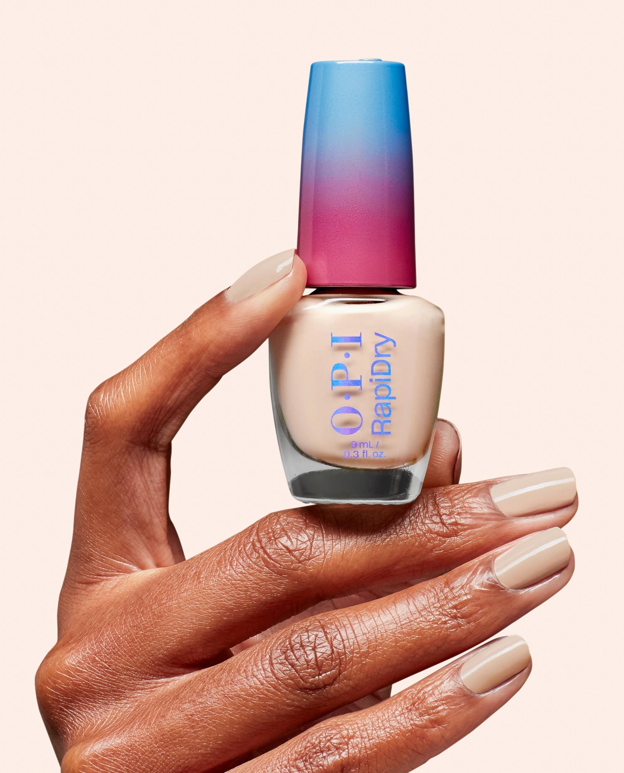 OPI Quick Sand RapiDry Quick-Dry Nail Polish Hand and Bottle