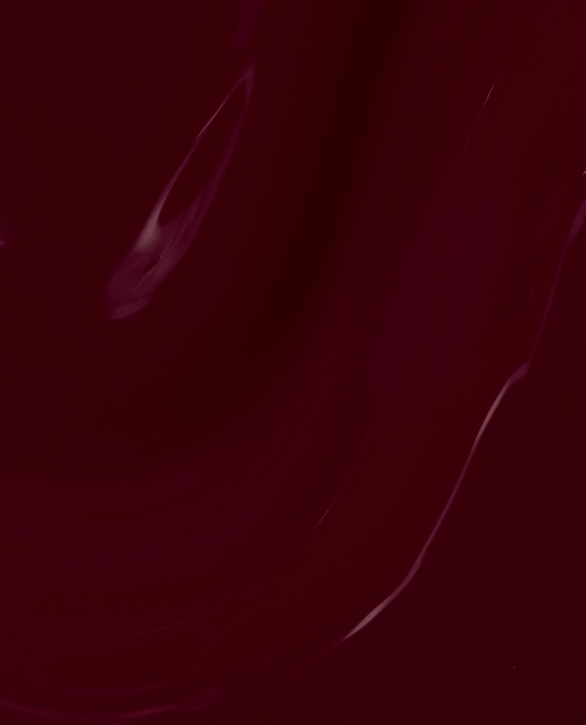 Raisin' The Bar OPI Infinite Shine nail polish swatch shows a glossy deep burgundy-red shade, a rich option for fall nail colors.