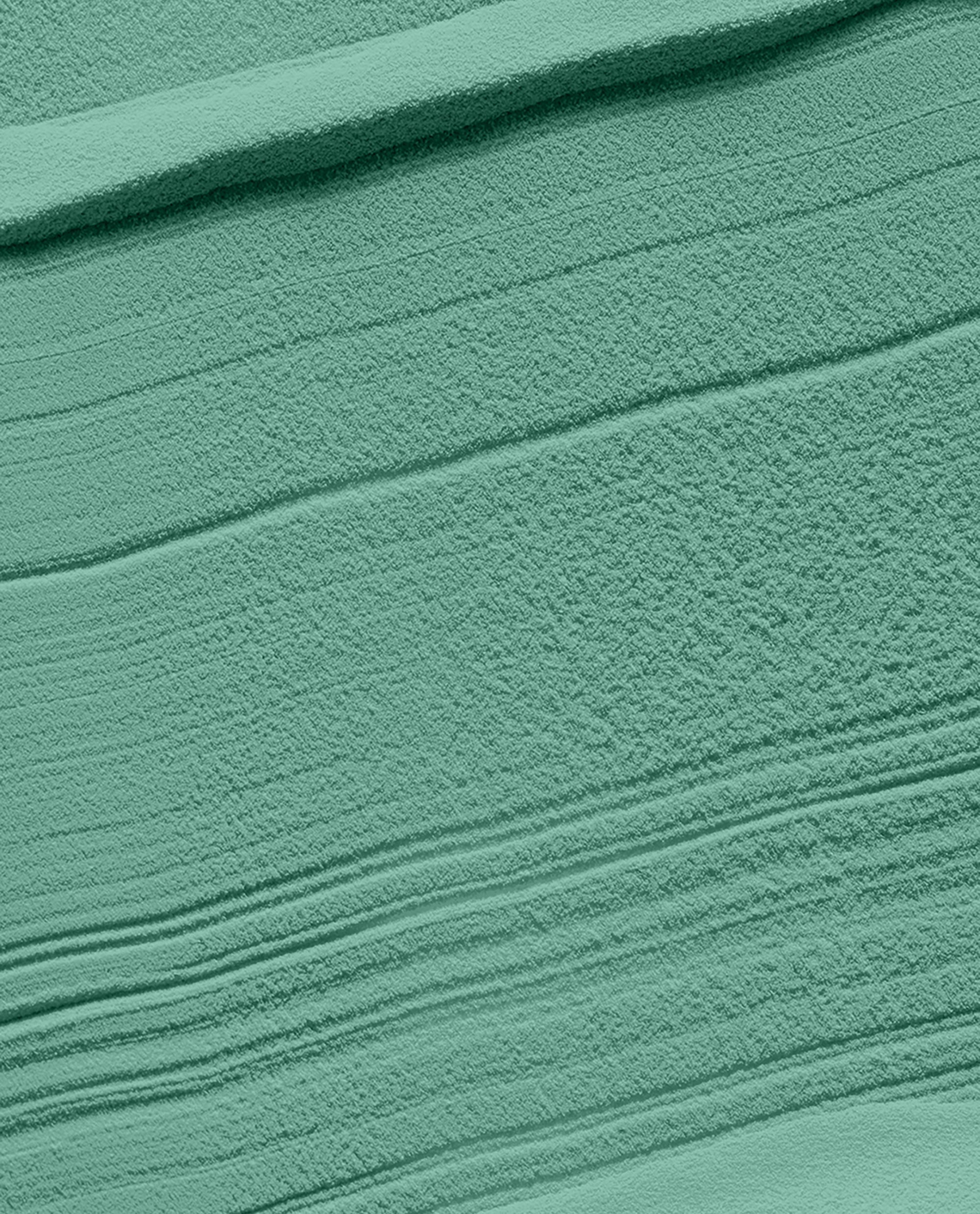 Rated Pea-G dipping powder swatch, a matte pea-green pigment swept in soft ridges, showcasing a fresh green nail polish look perfect for spring nail colors for fans of OPI.