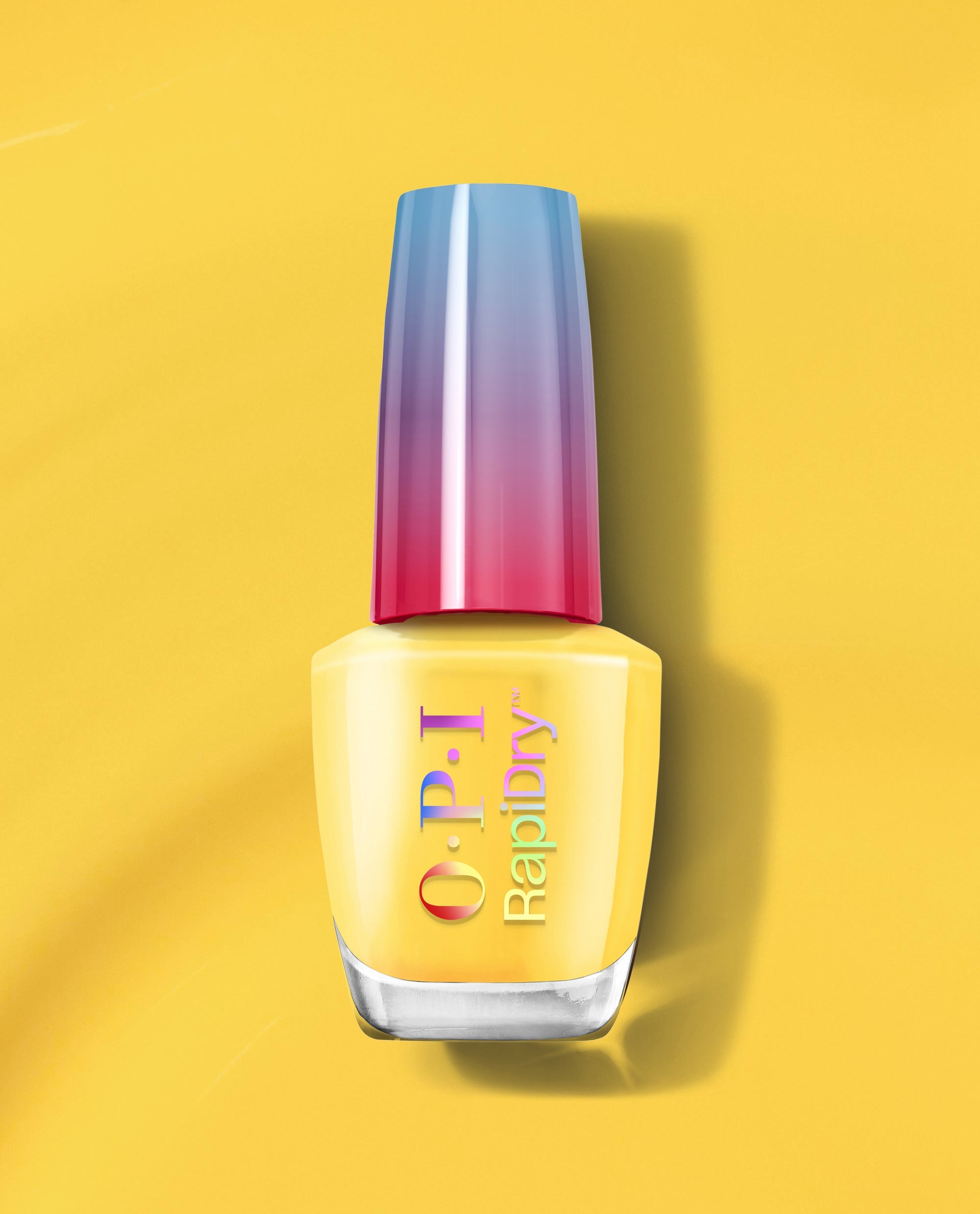 OPI RapiDry nail polish in Proceed with (No) Caution, a bright yellow shade, standing upright with a blue-to-pink gradient cap on a yellow background.