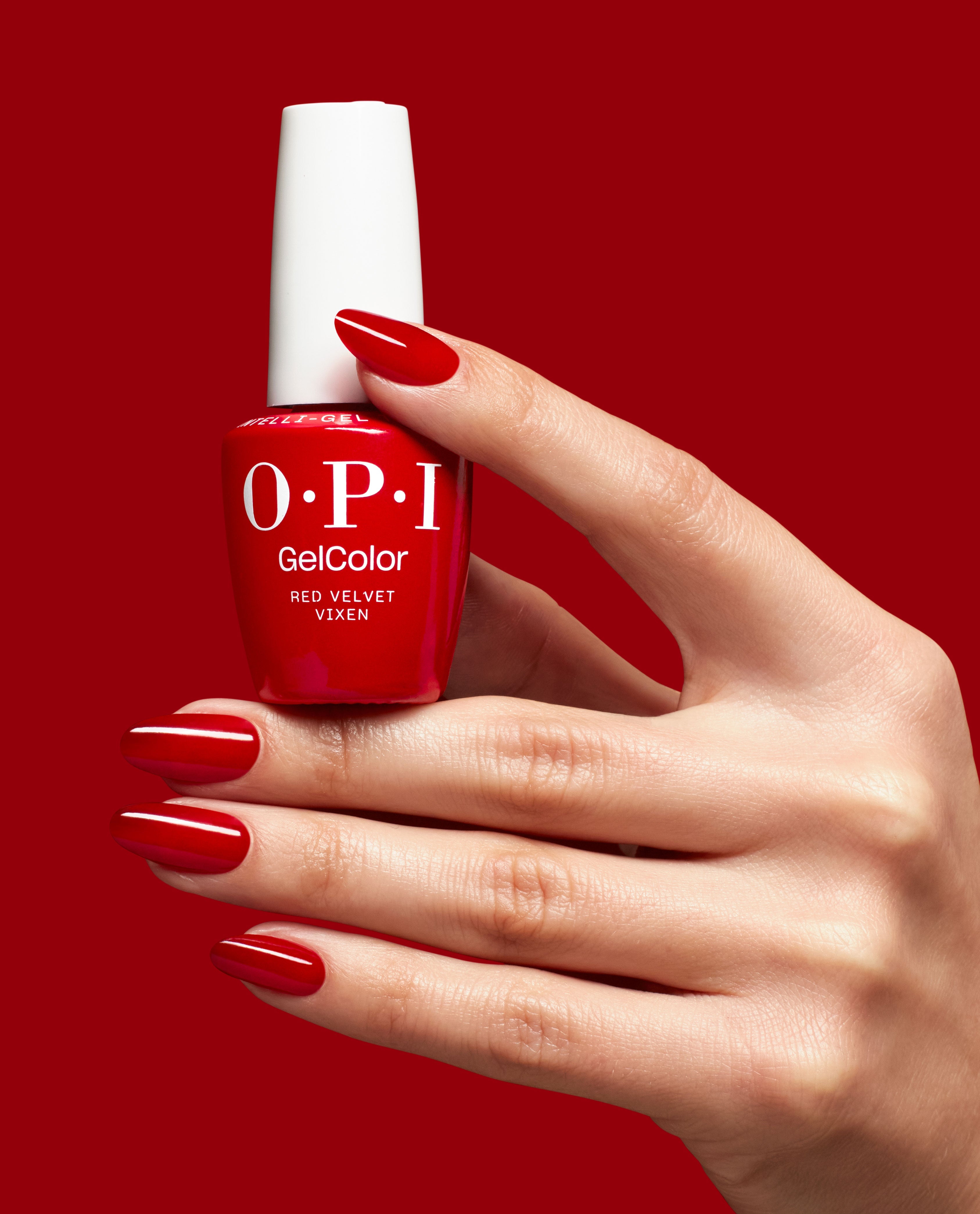 Red Velvet Vixen Red Gel Nail Polish Hand and Bottle