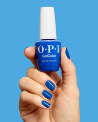 Sea-ze the Day Bold Blue Gel Nail Polish Hand and Product
