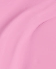 Seven Wonders of OPI nail lacquer brush swatch showing smooth, creamy light pink OPI nail polish spread in soft curved strokes against a solid background.