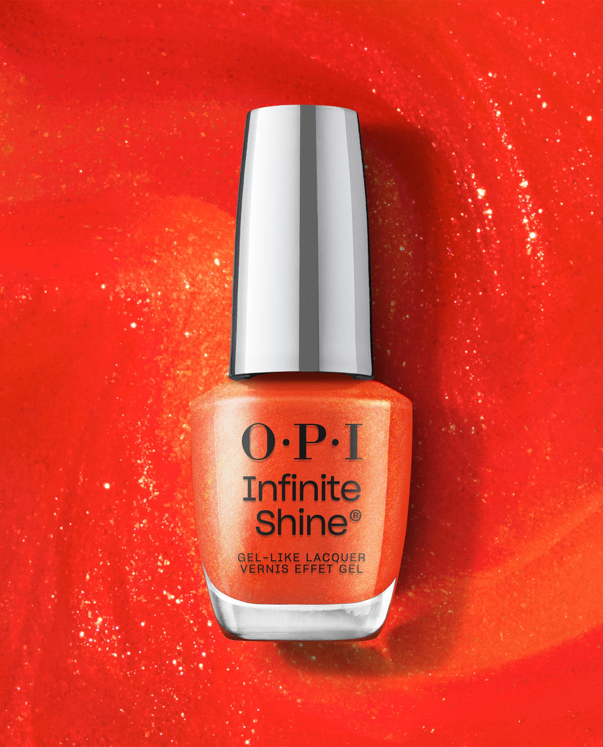 OPI Infinite Shine Shock Em Orange gel-like lacquer bottle stands centered on a glossy, glittering orange-red polish smear, showcasing a trending shimmery orange nail color.