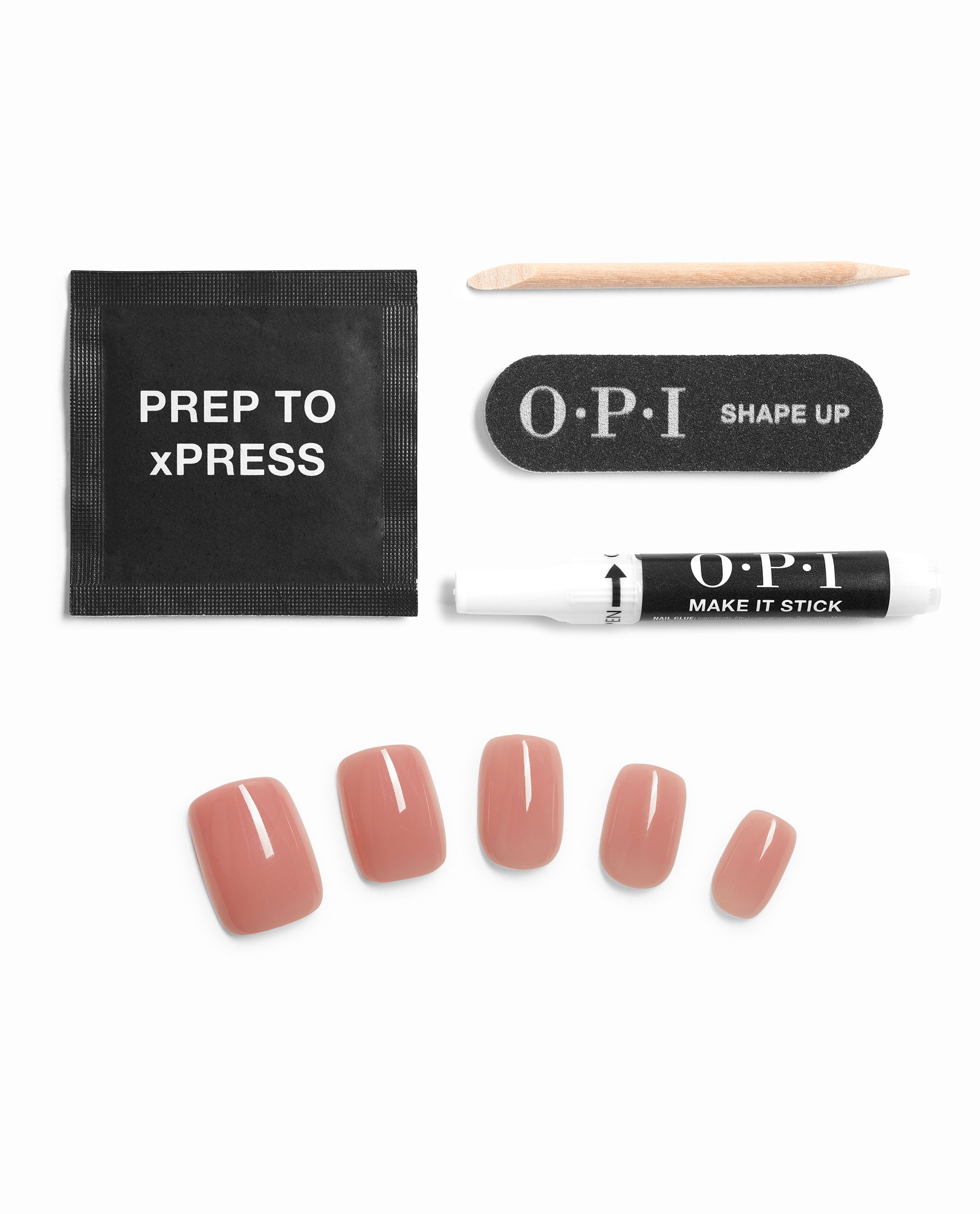 OPI Somewhere Over the Rainbow Mountains xPRESS/ON Iconic Shades (Short) nail polish gift set laid out on white background with blush pink press-on nails, prep pad, wooden cuticle stick, mini nail file, and adhesive pen.