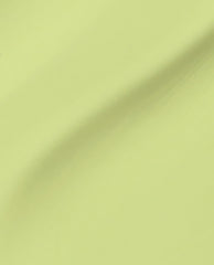 OPI Clear Your Cash nail lacquer swatch showing a smooth diagonal brushstroke of creamy, high-shine pastel chartreuse; close-up studio view highlighting texture and gloss for green nail polish and fresh spring nail colors.