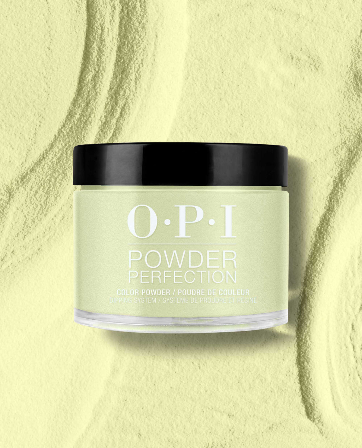 OPI Powder Perfection Clear Your Cash dipping powder jar with black lid displaying a soft pastel mint green shade, set on a matching powder-textured backdrop; perfect for green nail polish looks and fresh spring nail colors from OPI.