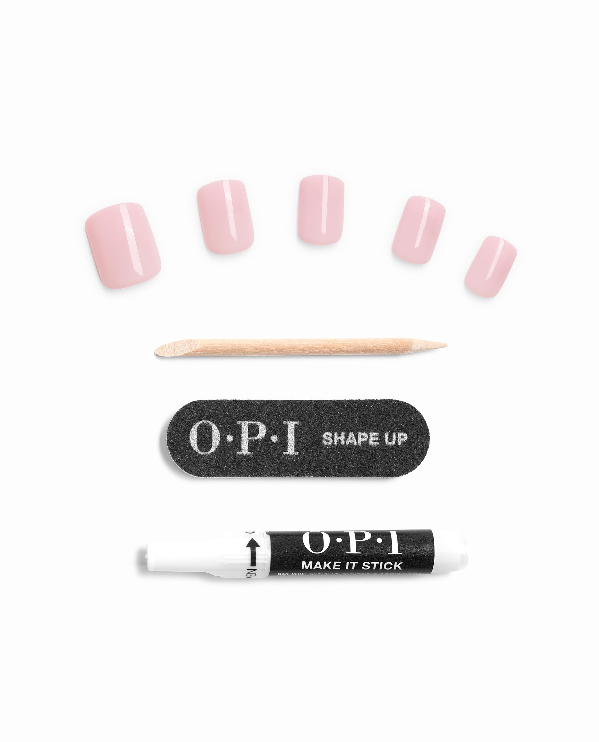 Baby, Take a Vow On Point OPI nail polish gift set with soft pink press-on nails, wooden cuticle stick, mini OPI Shape Up nail file, and OPI Make It Stick adhesive pen arranged neatly on a white background.