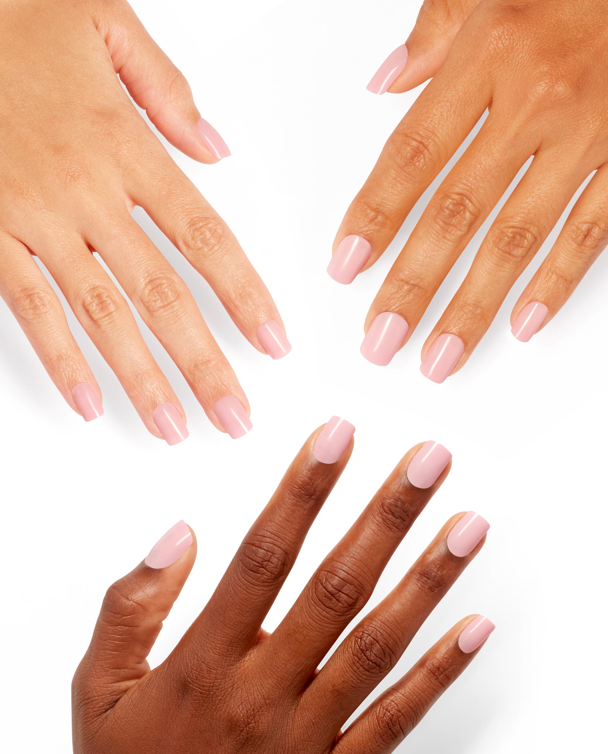 Multiple hands with neatly manicured nails display Baby, Take a Vow On Point in soft blush pink, showcasing the glossy finish of the OPI nail polish gift set against a clean white background.