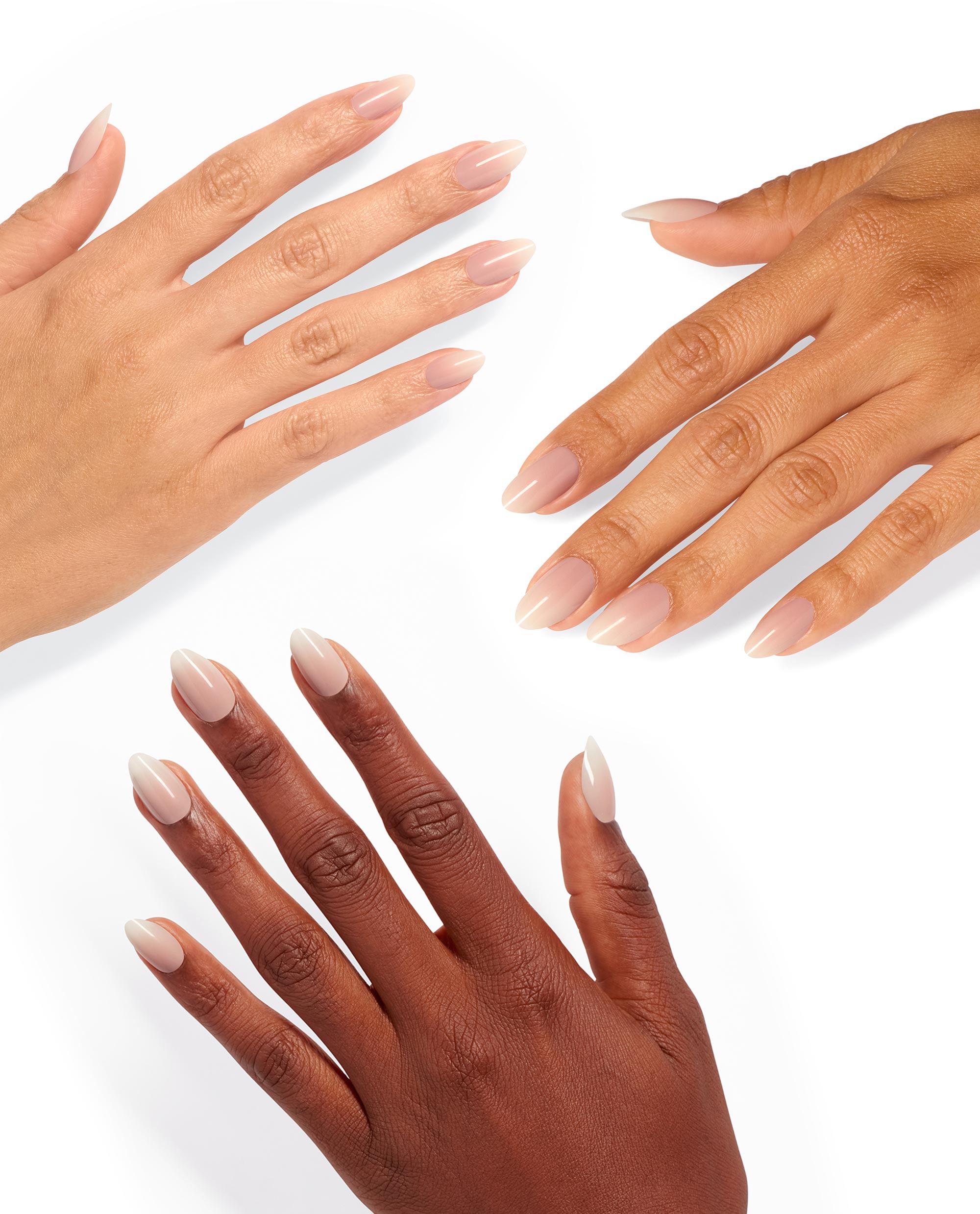 Three hands showcase Dream Come Hue xPRESS/ON Nail Art with glossy nude almond-shaped tips, highlighting the OPI nail polish gift set’s natural, minimalist manicure look on diverse skin tones against a clean white background.