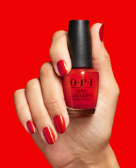 Spread the Cherry Red Nail Polish Hand and Bottle