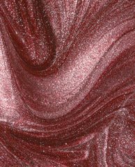 Stellar Tips Infinite Shine OPI nail polish swirling in a close-up liquid texture, showing a rich rose-gold base packed with fine metallic glitter and shimmer for a high-shine, sparkling manicure finish.