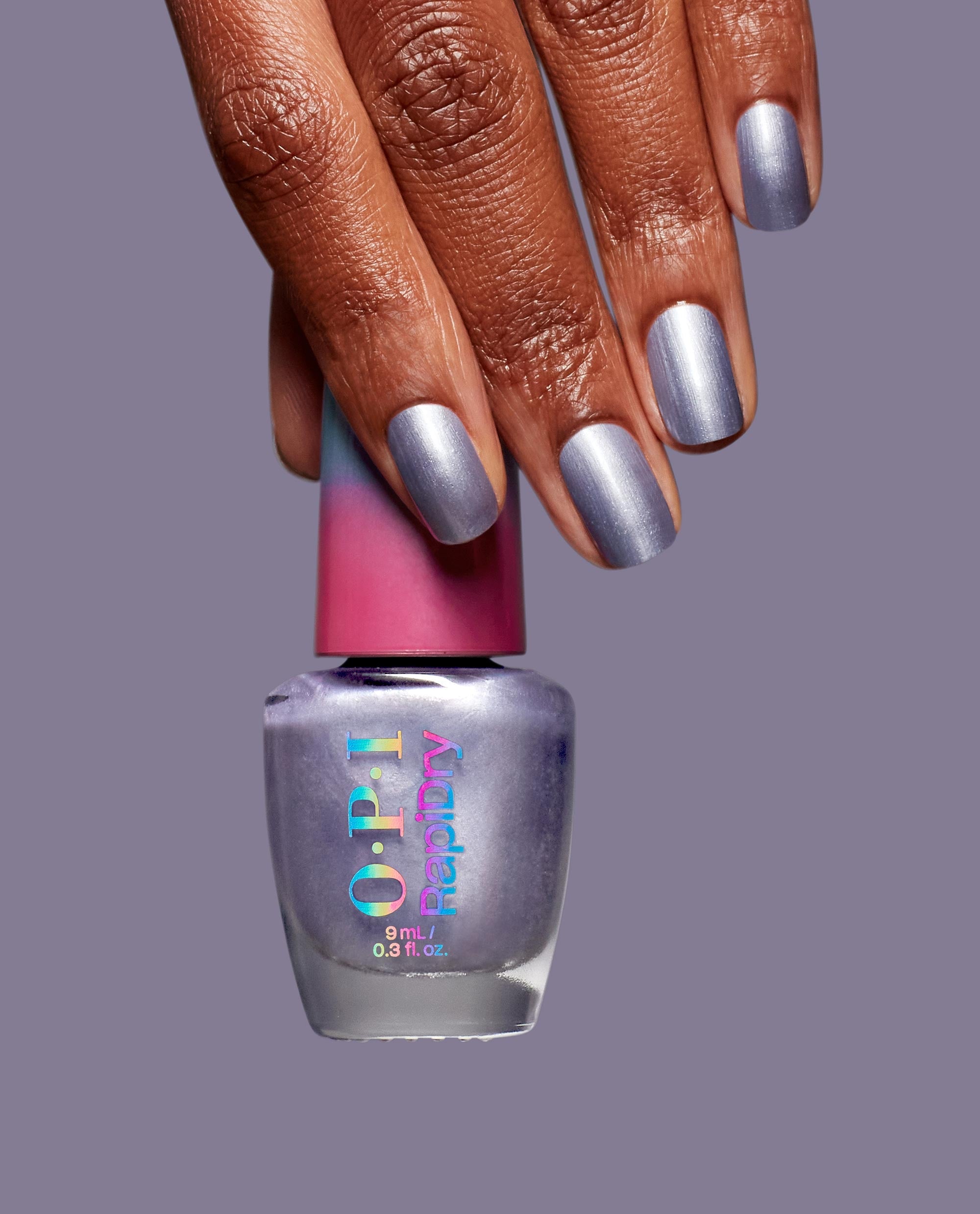 OPI Stop, Drop n’ Whoa Quick-Dry Nail Polish Hand and Bottle