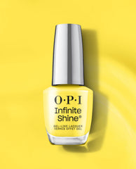 OPI Infinite Shine Sunkissed and Tell yellow gel-like nail lacquer bottle stands upright on a bright yellow background with a reflective silver cap and soft shadow.