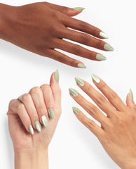 Taurus-t Me xPRESS/ON Effects press-on nails showcasing shimmery sage green nail polish on almond shapes, three hands fanned to display a smooth, satiny finish—fresh spring nail colors by OPI for a quick at-home manicure.
