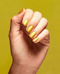 Hand with neatly manicured nails wearing The Leo-nly One OPI nail polish, a metallic golden-yellow nail lacquer that shifts in the light against a matching bright yellow background, showcasing the bold shimmer finish.