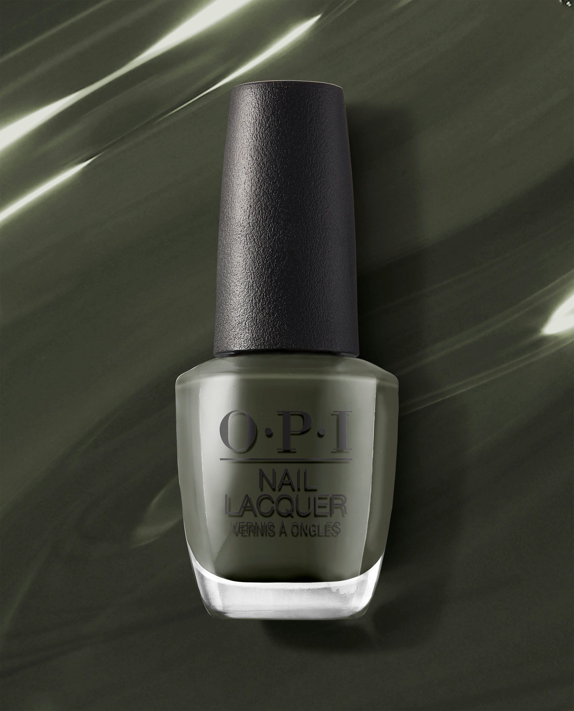 Things I’ve Seen in Aber-green OPI nail polish bottle standing upright, showcasing deep moss-green nail lacquer in a clear glass bottle with black cap against a glossy matching green background.