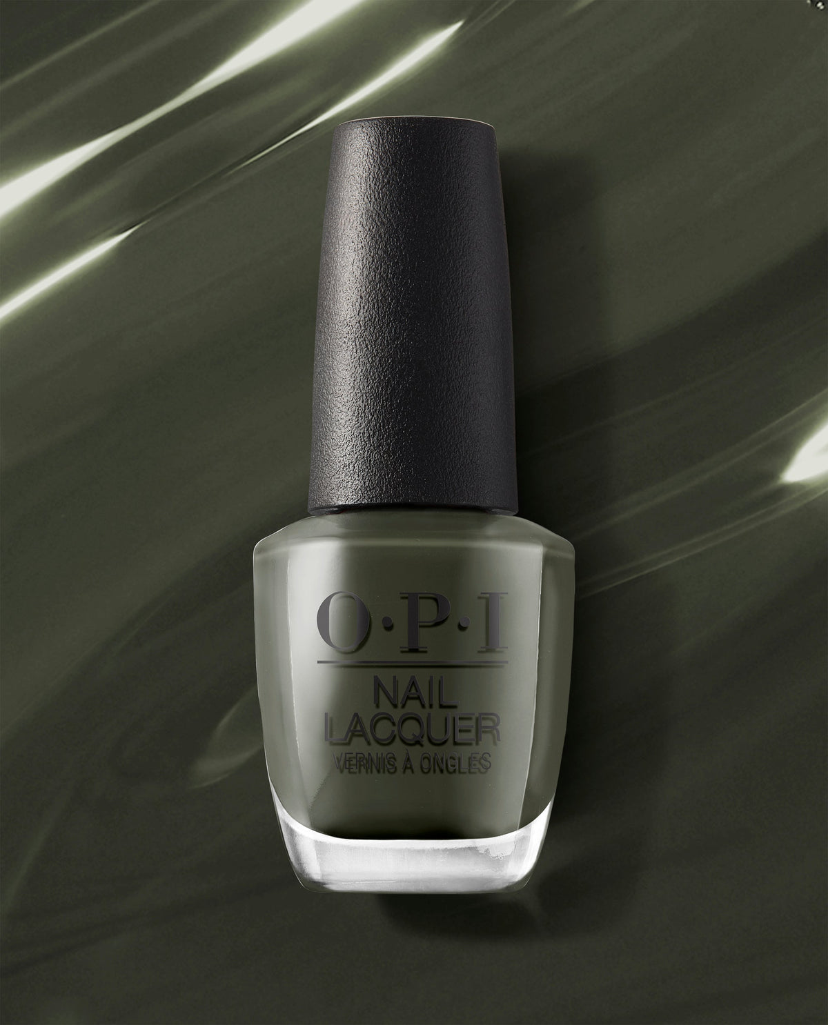 Things I’ve Seen in Aber-green OPI nail polish bottle standing upright, showcasing deep moss-green nail lacquer in a clear glass bottle with black cap against a glossy matching green background.