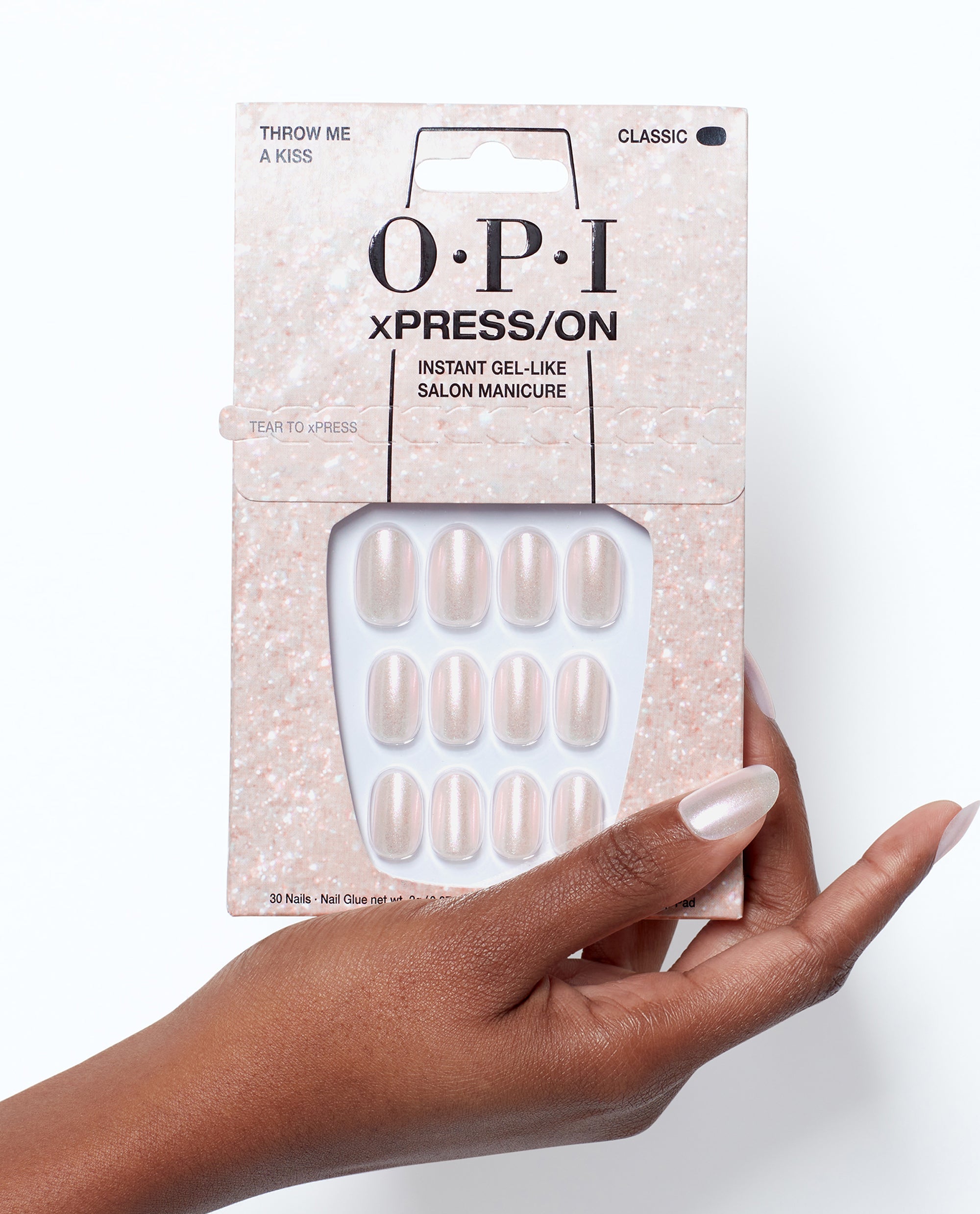 OPI Throw Me a Kiss - Short Shimmery Pink Press-on Nails Hand and Product