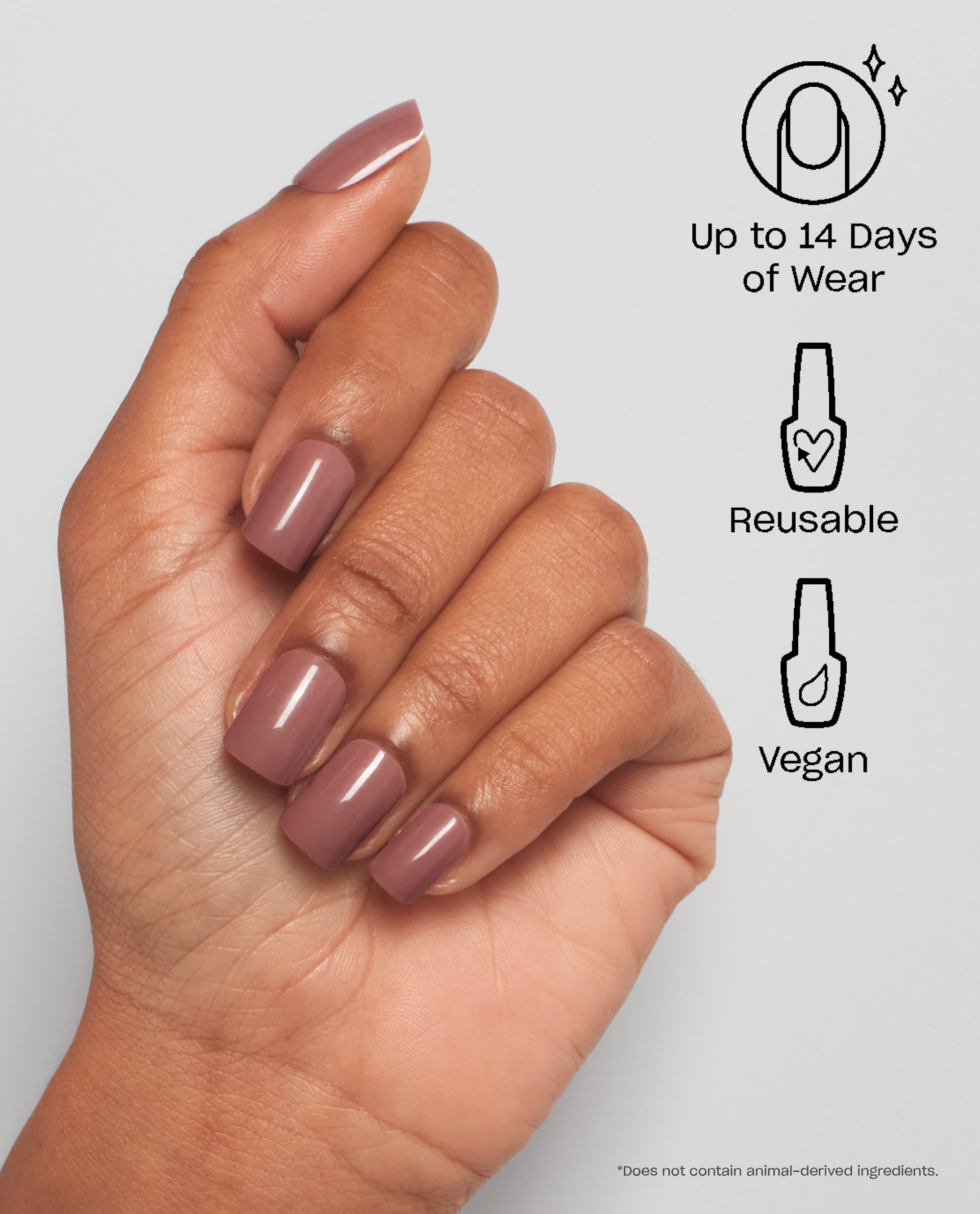 Hand models Tickle My France-y On Point nails in a mauve-pink shade, showcasing glossy square tips beside icons listing benefits: up to 14 days of wear, reusable, and vegan, promoting an OPI nail polish gift set style manicure for US shoppers.