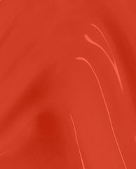 Totally Red-ical nail lacquer swatch shows a glossy, vivid red-orange shade with subtle brush streaks, a bold OPI option for fall nail colors.