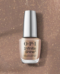 OPI Infinite Shine Track Suited Cutie gel-like lacquer bottle in a warm taupe shade with gold shimmer, displayed on a matching glitter background for fall nail colors.