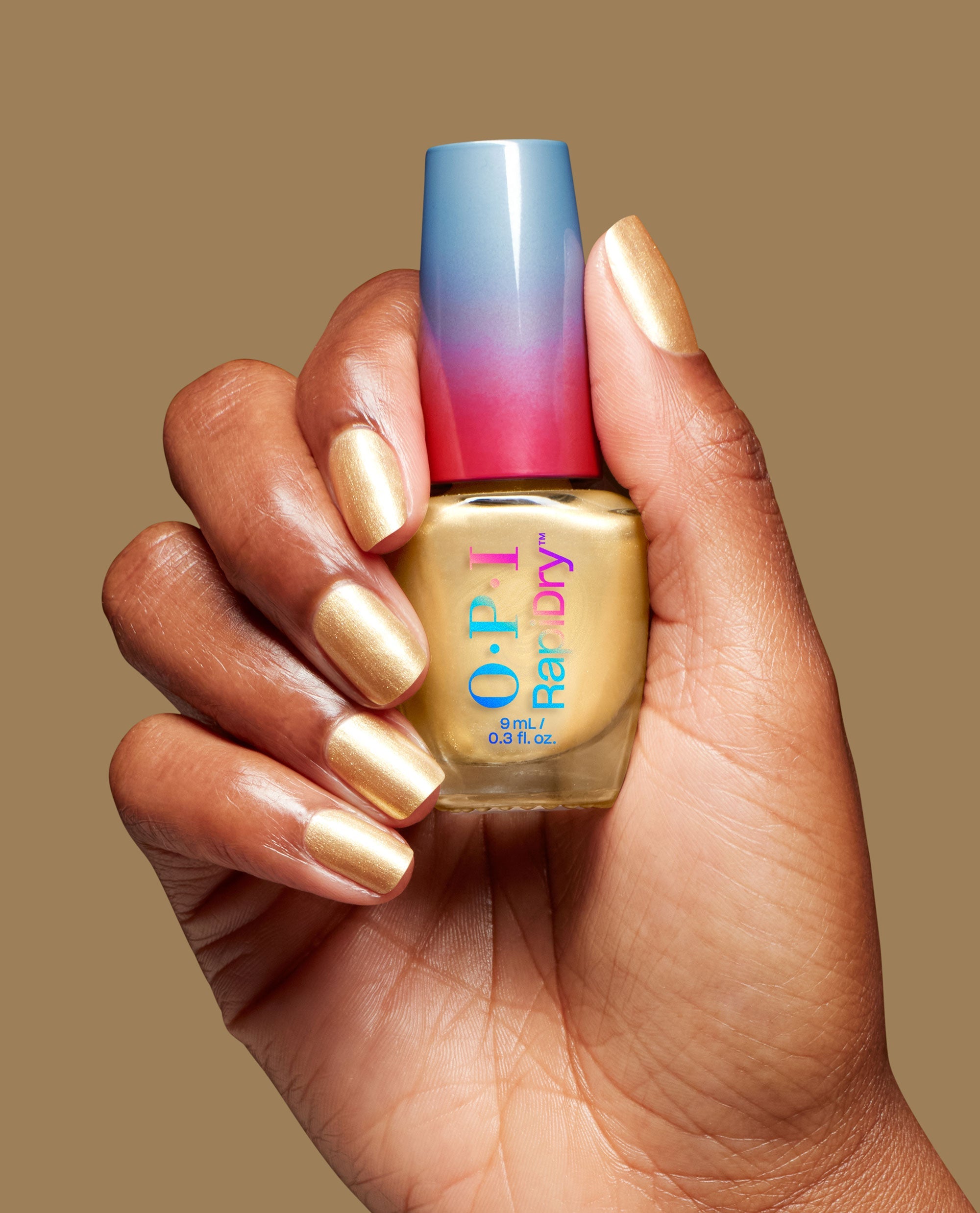 Winter Gets the Gold Quick-Dry Nail Polish Hand & Bottle