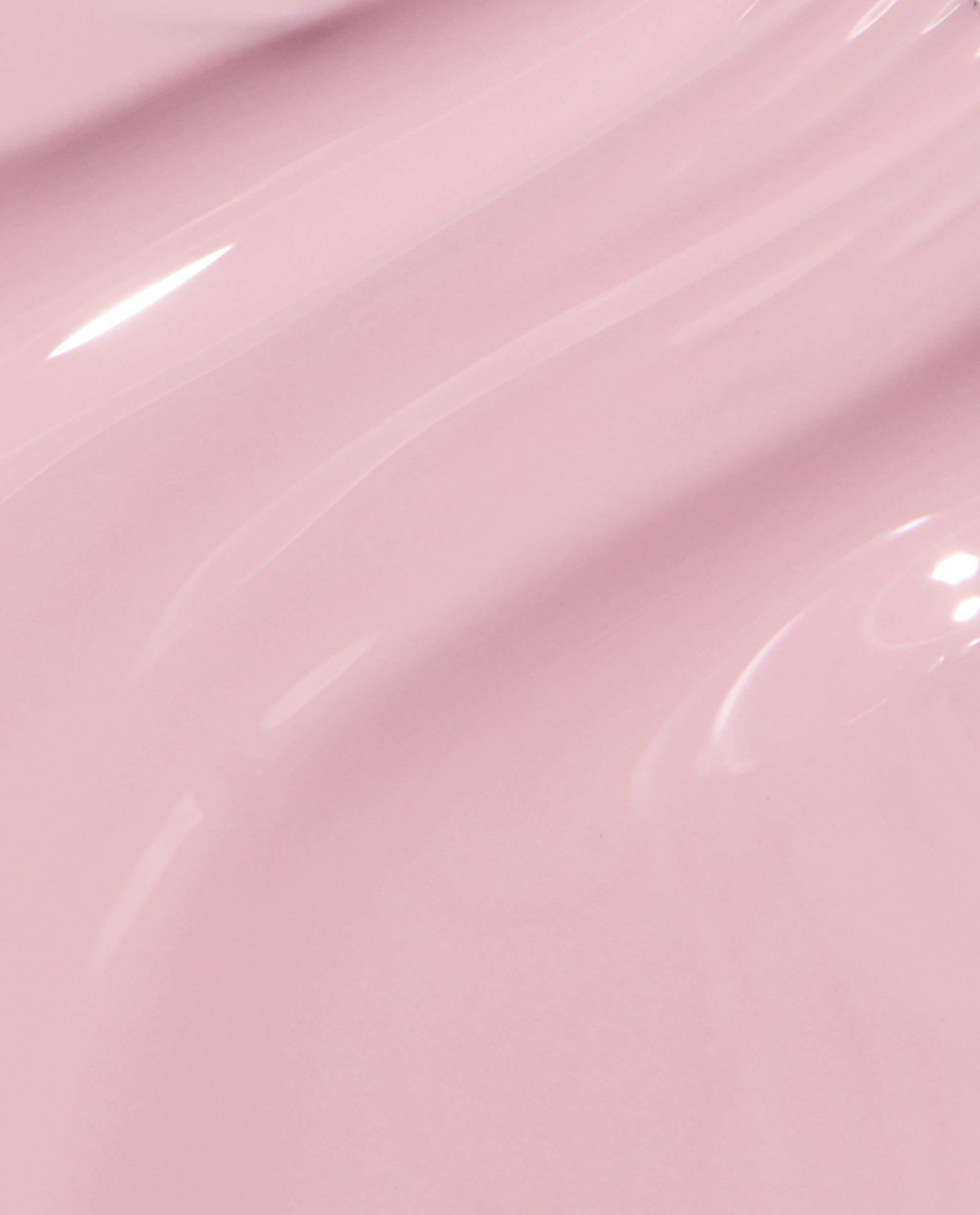 Glossy pale pink OPI nail polish, You’ve Got that Glas-glow, flowing in smooth, wavy brushstrokes that highlight its glass-like shine and creamy nail lacquer texture on a clean studio backdrop.