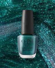 OPI Yuletide Sweetings! Nail Lacquer bottle standing upright, showcasing glittery emerald green nail polish, set against a matching teal sparkle backdrop—festive and bold, ideal for spring nail colors from OPI.